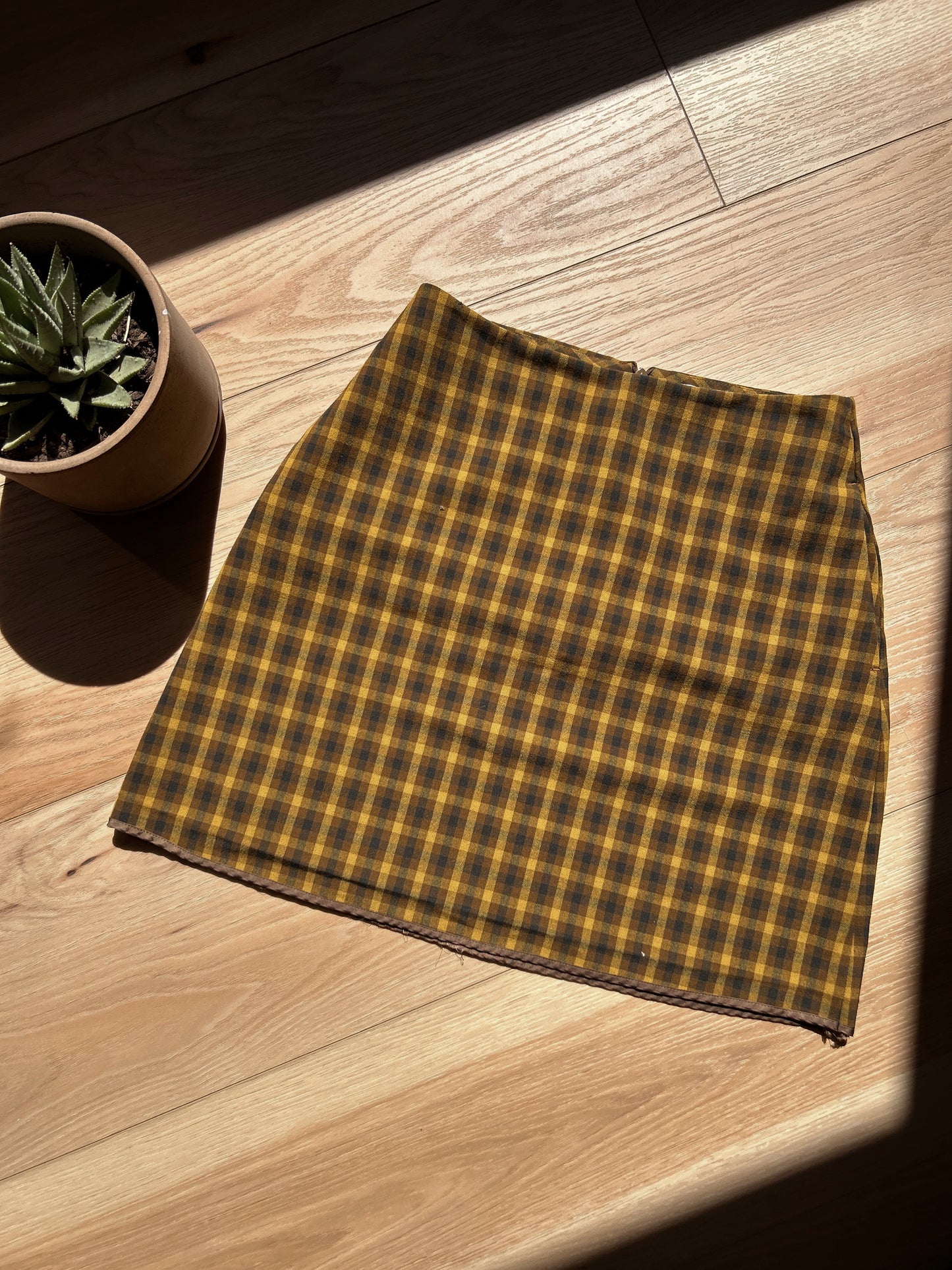 aritzia plaid skirt